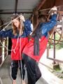 two of our archive girls in shiny nylon rainwear and bondage