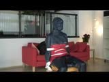 03:40 Min. video with Nicole tied and gagged in shiny nylon rainwear