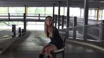 Stella on chair at car park 1/2