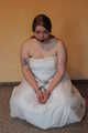 Sandra cuffed in a wedding dress 01