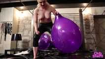 470 Chrissy pops 3 of her logo balloons