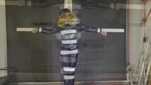 Lana tied and gagged in a shiny nylon Downjacket