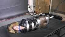 Rachel Adams bound, gagged and suspended in shiny nylon Down