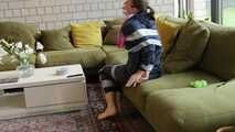 Rachel Adams bound and gagged by an Intruder in shiny Rainwear