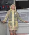 Miss Francine in yellow Schmuddelwedda raincoat
