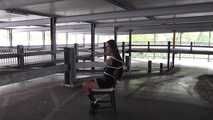 Stella on chair at car park 2/2