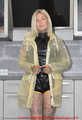 Miss Francine in yellow Schmuddelwedda raincoat