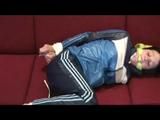 03:10 Min. video with Isabelle tied and gagged in shiny nylon clothes
