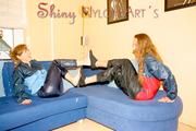 Stella and Leonie having fun with eachother wearing sexy shiny nylon rainwear (Pics)