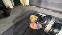 Rachel Adams bound, gagged and suspended in shiny nylon Down
