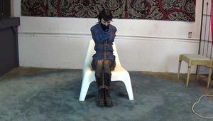 Nichole in jacket bag bondage