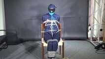 Marie bound and gagged in shiny nylon Rainwear