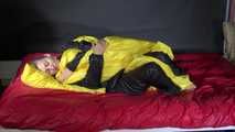 Sexy Sandra wearing sexy shiny nylon rainwear lolling in bed of nylon (Pics)