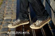Chucks and naked feet outdoor