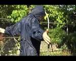 Mara wearing only a hot rain jacket and rubber boots lingering in the garden taking a shower (Video)