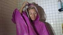 Watching Sandra wearing only a pink shiny nylon raincape under the shower playing with the water (Video)
