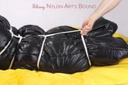 Jill tied and gagged in an big shiny down bag to lie in (Pics)