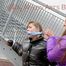 One archive girl tied and gagged by another archive girl outdoor wearing shiny down jackets (Pics)