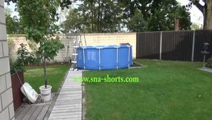 Get a Video with Sandra cleaning the Pool in her shiny nylon Shorts