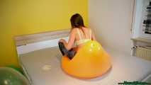 riding and sitpopping big balloons