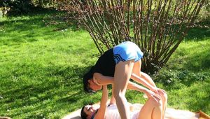 Jill tied by her friend in shiny nylon shorts