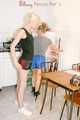 Jenny and a friend of her sitting on the balcony with eachother wearing sexy shiny nylon shorts ans tops (Pics)