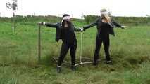Jasmin & Larissa tied on fence Photoshoot