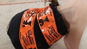 Tape tied with tight tape gag