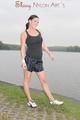 Enni outdoor wearing a sexy black shiny nylon shorts and a black top (Pics)