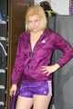 Pia enjoying a cupboard full of shiny nylon clothes trying on purple shiny nylon shorts and rain jacket (Pics)