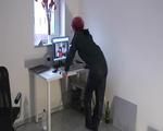 Marlin doing PC work wearing a hot rainwear combination (Video)