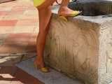 yellow leather mules and tits