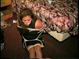 24 YR OLD LATINA HOUSEWIFE MOUTH STUFFED, WRAP TAPE GAGGED, BAREFOOT & TOE TIED (D61-11)