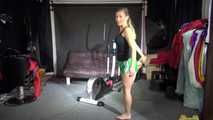 Watching sexy Sandra during her workout wearing a sexy green shiny nylon shorts and a black top (Video)