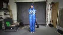 Myxxxy bound and gagged in a shiny nylon Skisuit