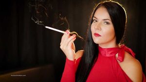 Seductive woman Tanya adores smoking a 120mm cigarette with a holder