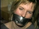Flight Attendant Wrapped Tied & Gagged with Duct Tape (D22-4)