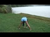 Enni during stretching wearing shiny nylon shorts and an oldschool rain jacket (Video)