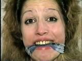 TAMARA IS MOUTH STUFFED, CLEAVE GAGGED, OTM GAGGED, HANDGAGGED & DOES LOTS OF GAG TALKING (D51-7)
