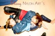 Stella and Leonie having fun with eachother wearing sexy shiny nylon rainwear (Pics)
