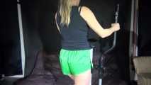 Watching sexy Sandra during her workout wearing a sexy green shiny nylon shorts and a black top (Video)