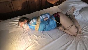 Watch Rachel Adams bound and gagged in shiny nylon Shorts and Windbreaker  