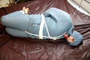 Jill tied and gagged in a shiny nylon oldschool skisuit