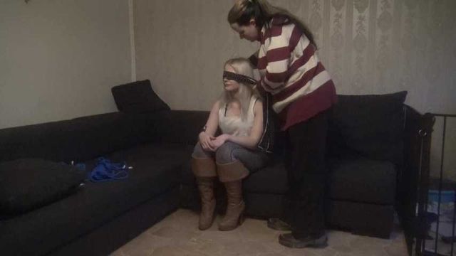 Elysa roped on couch 