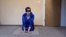 Sunny cuffed on the floor