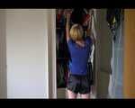 Watching Sonja coming home trying on several shiny nylon shorts to wear at home (Video)
