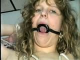 19 Yr OLD SINGLE MOM RONI IS HOME MADE RING GAGGED, HANDS TIED BEHIND HER HEAD & TIED UP SITTING BACKWARDS TO A CHAIR (D50-10)