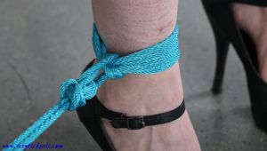 Tied standing and tickled