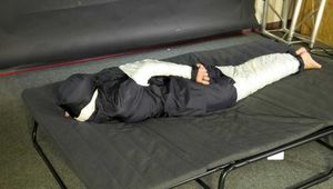 Rachel Adams taped and gagged in shiny nylon Rainwear