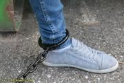 Cuffed to a heavy container